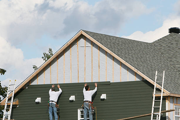 Professional Siding Contractor technician working in Scottsville, VA